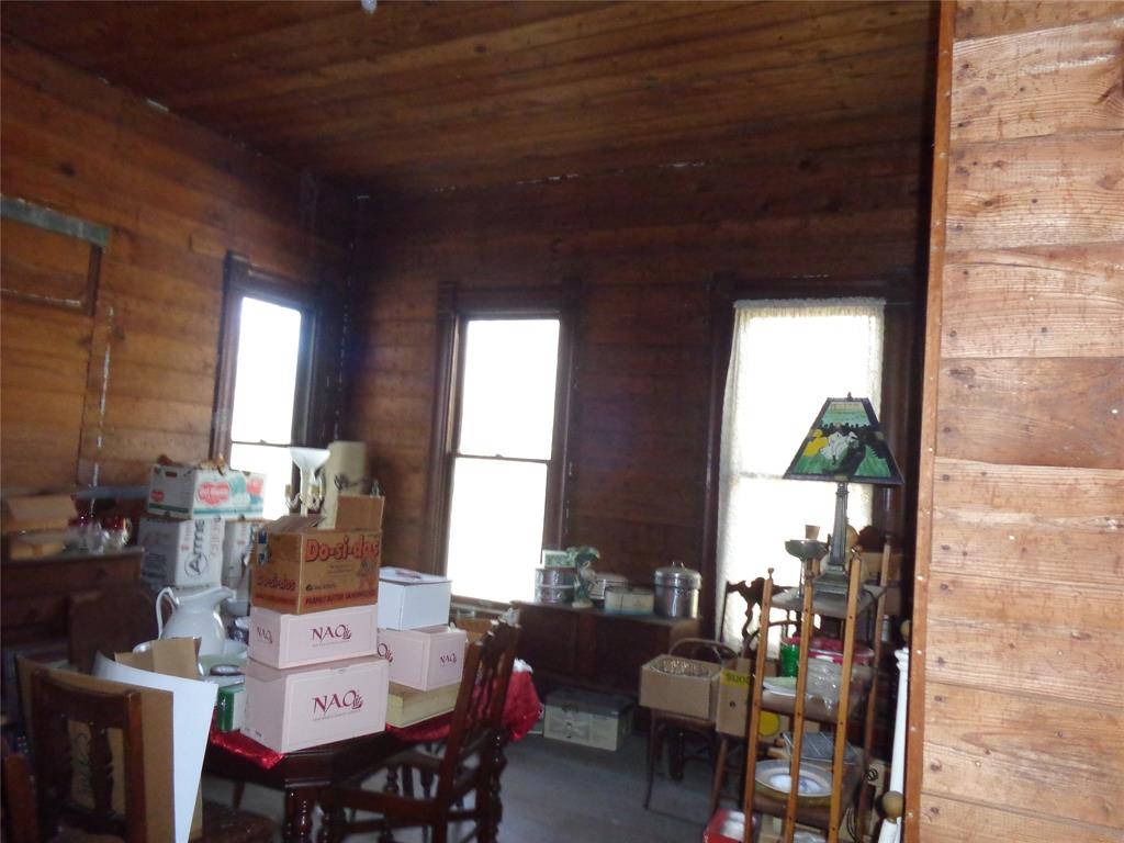 506 South 3rd Street Grandview, TX 76050 - Photo 14 of 39 a living room with furniture and a potted plant