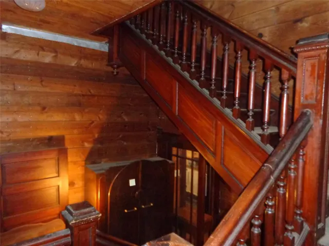 a yellow house with a outdoor space