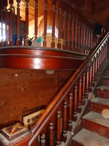 a room with furniture and a large window