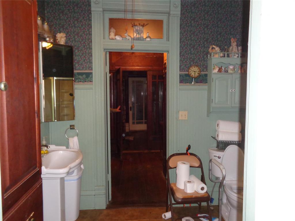 506 South 3rd Street Grandview, TX 76050 - Photo 7 of 39 a room with furniture and natural light