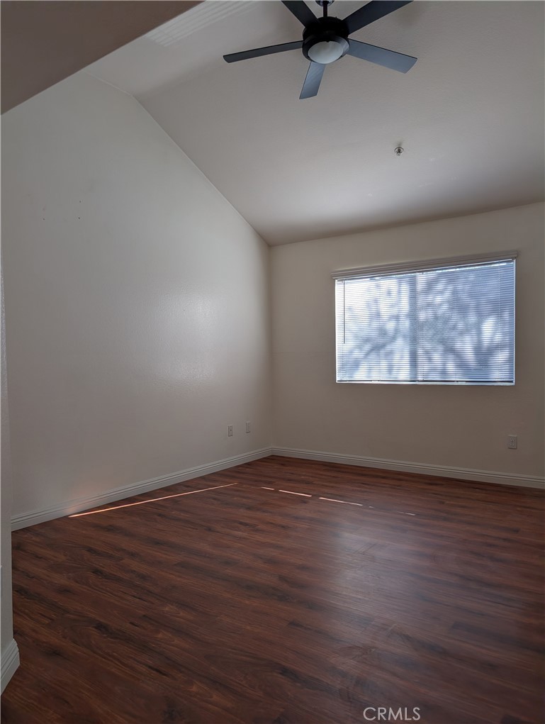 13133 Le Parc, Unit 1009 Chino Hills, CA 91709 - Photo 14 of 21 a view of an empty room with a window and wooden floor