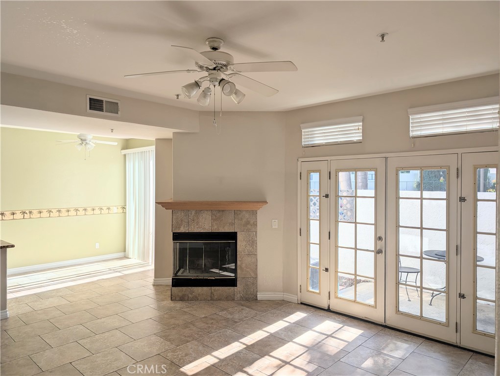 13133 Le Parc, Unit 1009 Chino Hills, CA 91709 - Photo 6 of 21 a view of an empty room with a fireplace and a window