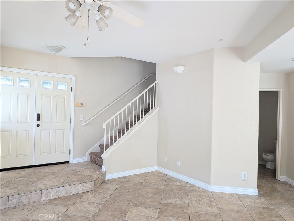 13133 Le Parc, Unit 1009 Chino Hills, CA 91709 - Photo 7 of 21 a view of entryway and hall with a chandelier
