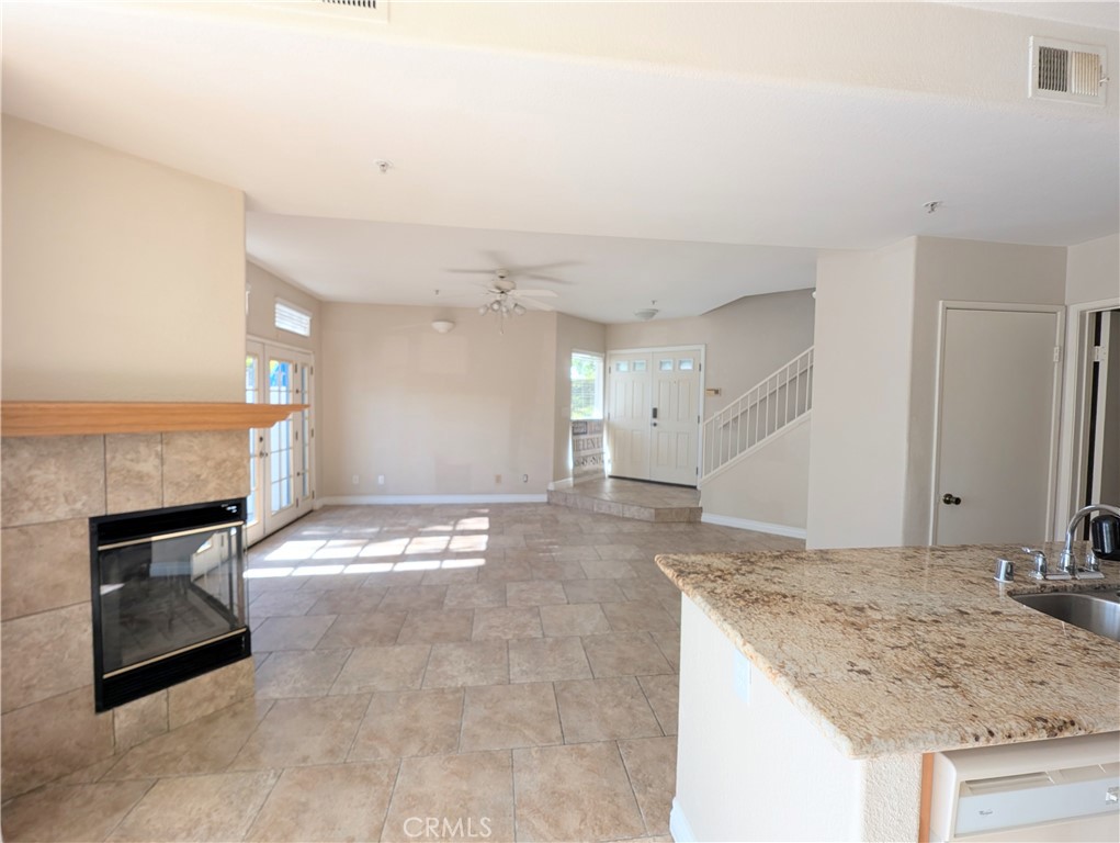 13133 Le Parc, Unit 1009 Chino Hills, CA 91709 - Photo 9 of 21 a view of a kitchen with a sink and a stove