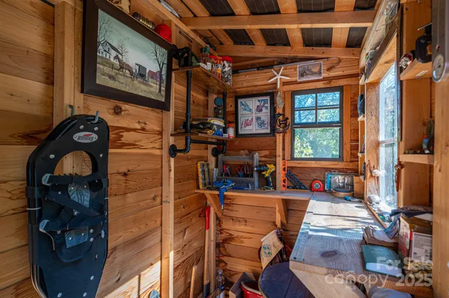 a view of a chairs and table in a patio