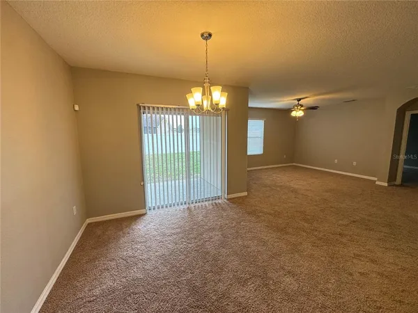 a view of a room with natural light
