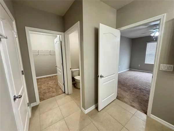 a bathroom with a shower and a sink