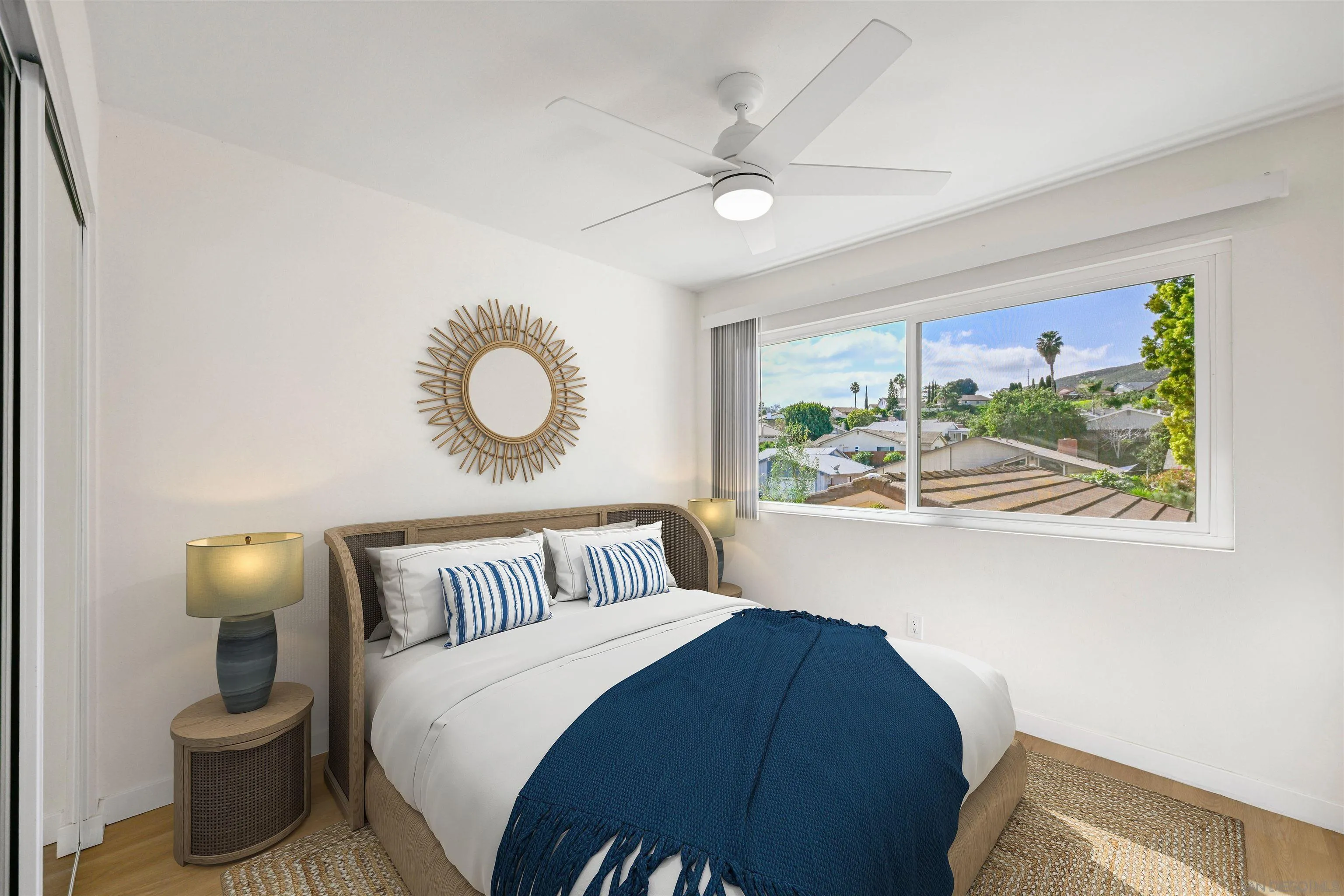 11218 Poblado Road San Diego, CA 92127 - Photo 24 of 35 a bedroom with a bed and window