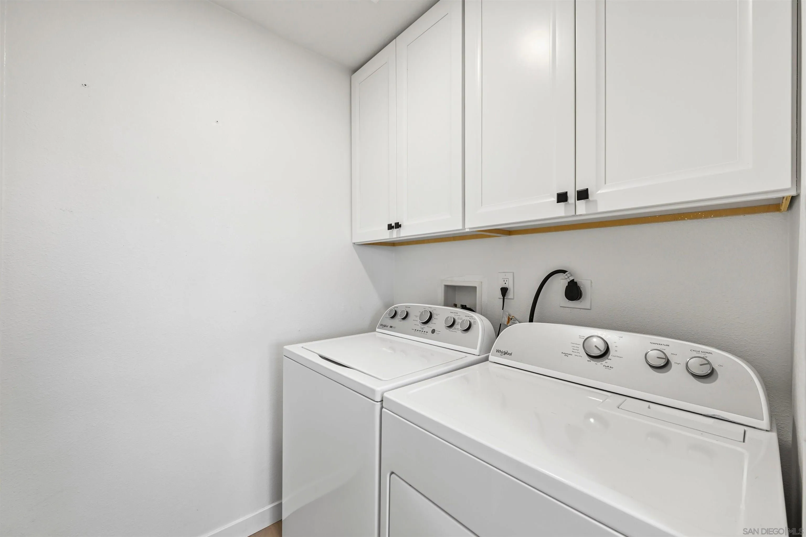 11218 Poblado Road San Diego, CA 92127 - Photo 26 of 35 a utility room with dryer and washer