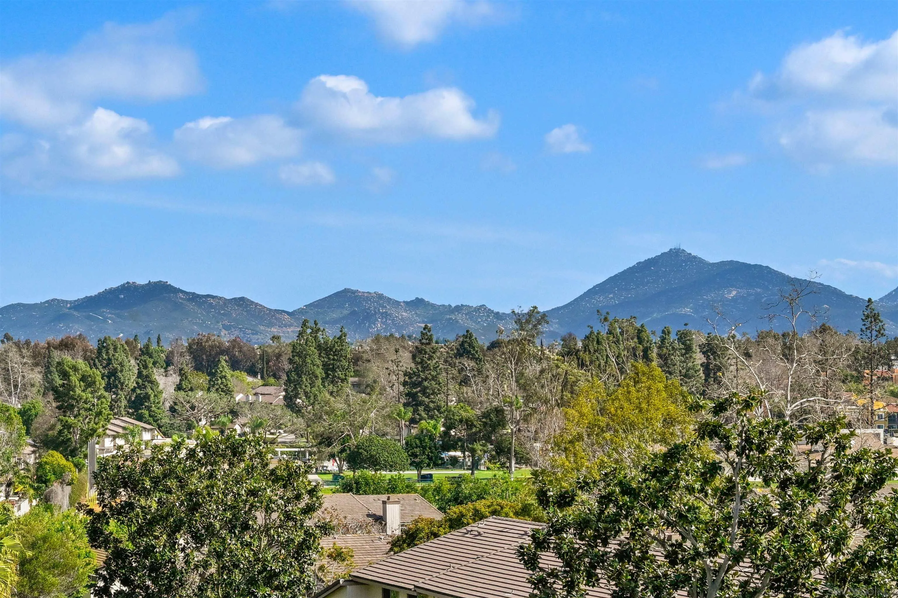 11218 Poblado Road San Diego, CA 92127 - Photo 4 of 35 a view of a city with a mountain