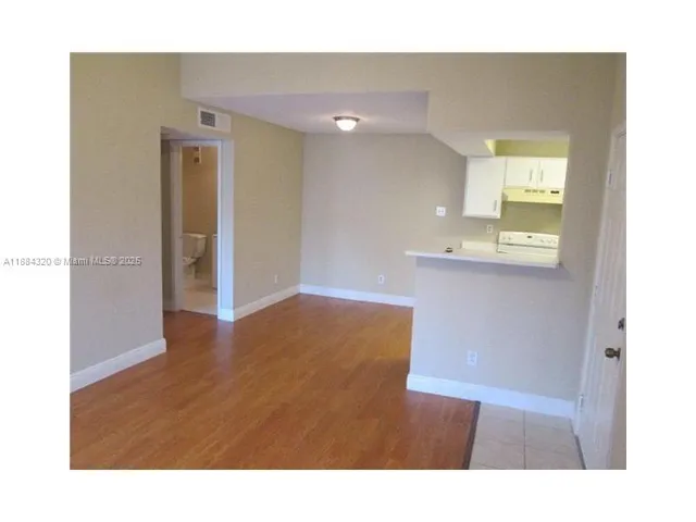 a bathroom with a sink a mirror and a toilet