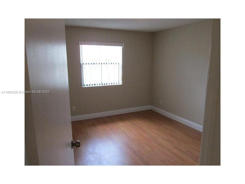 15040 Southwest 103rd Lane, Unit 3202 Miami, FL 33196 - Photo 9 of 14 a bathroom with a sink