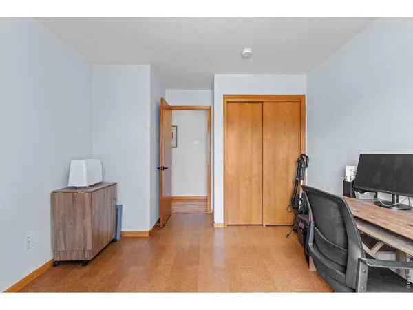 a workspace with furniture and a window