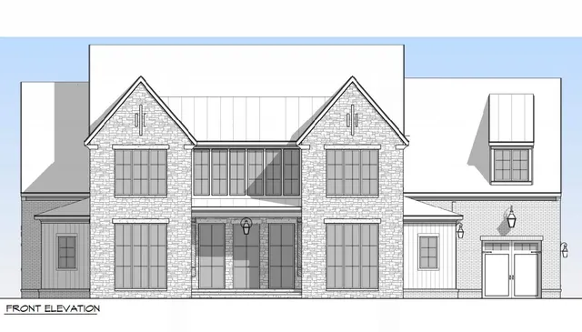 a black and white photo of a living room