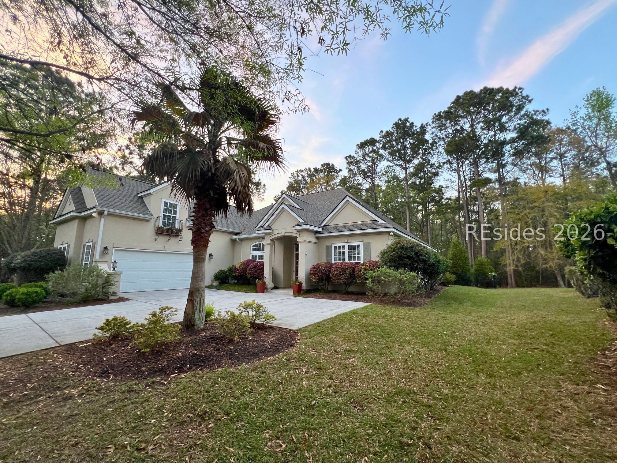 108 Spring Meadow Drive Bluffton, SC 29910 - Photo 2 of 22 Side-load Garage - Fenced Yard - Wooded View