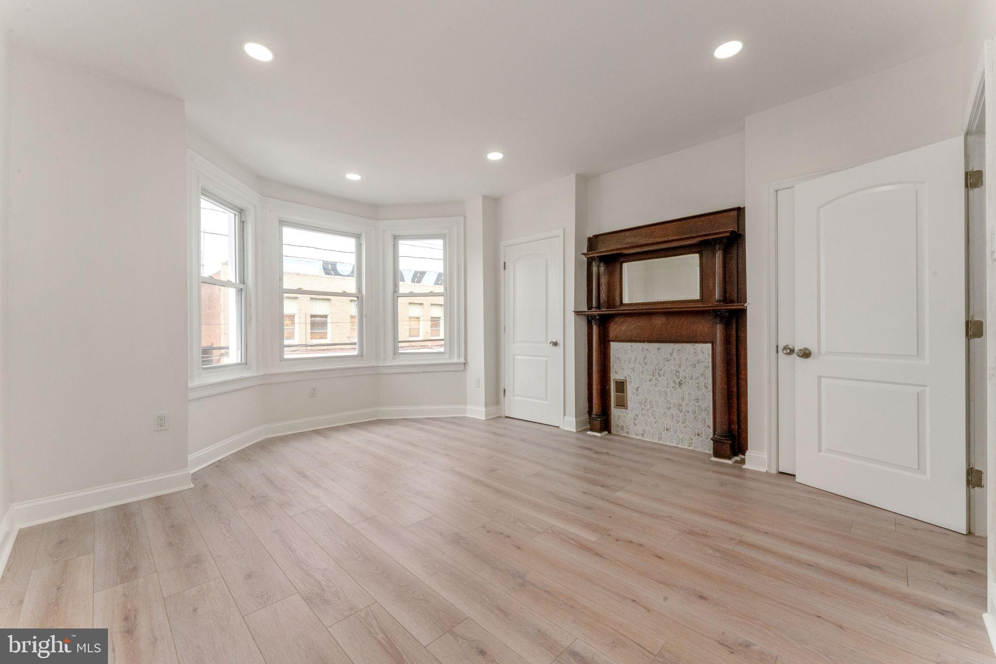 7 South 53rd Street Philadelphia, PA 19139 - Photo 10 of 23 Main bedroom Original Fireplace/mirror