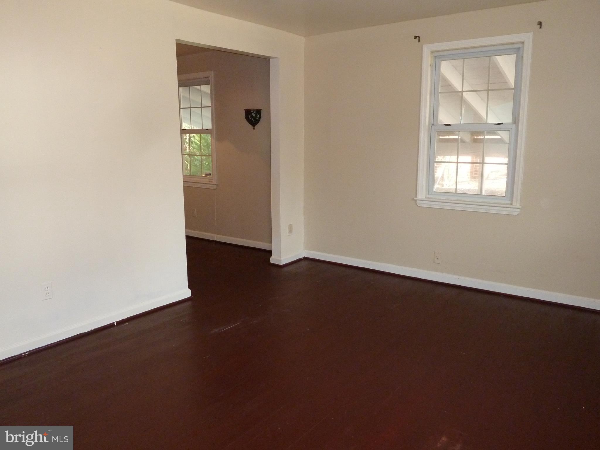 10702 Malone Street Silver Spring, MD 20902 - Photo 19 of 49 Living Room with Hardwood Flooring