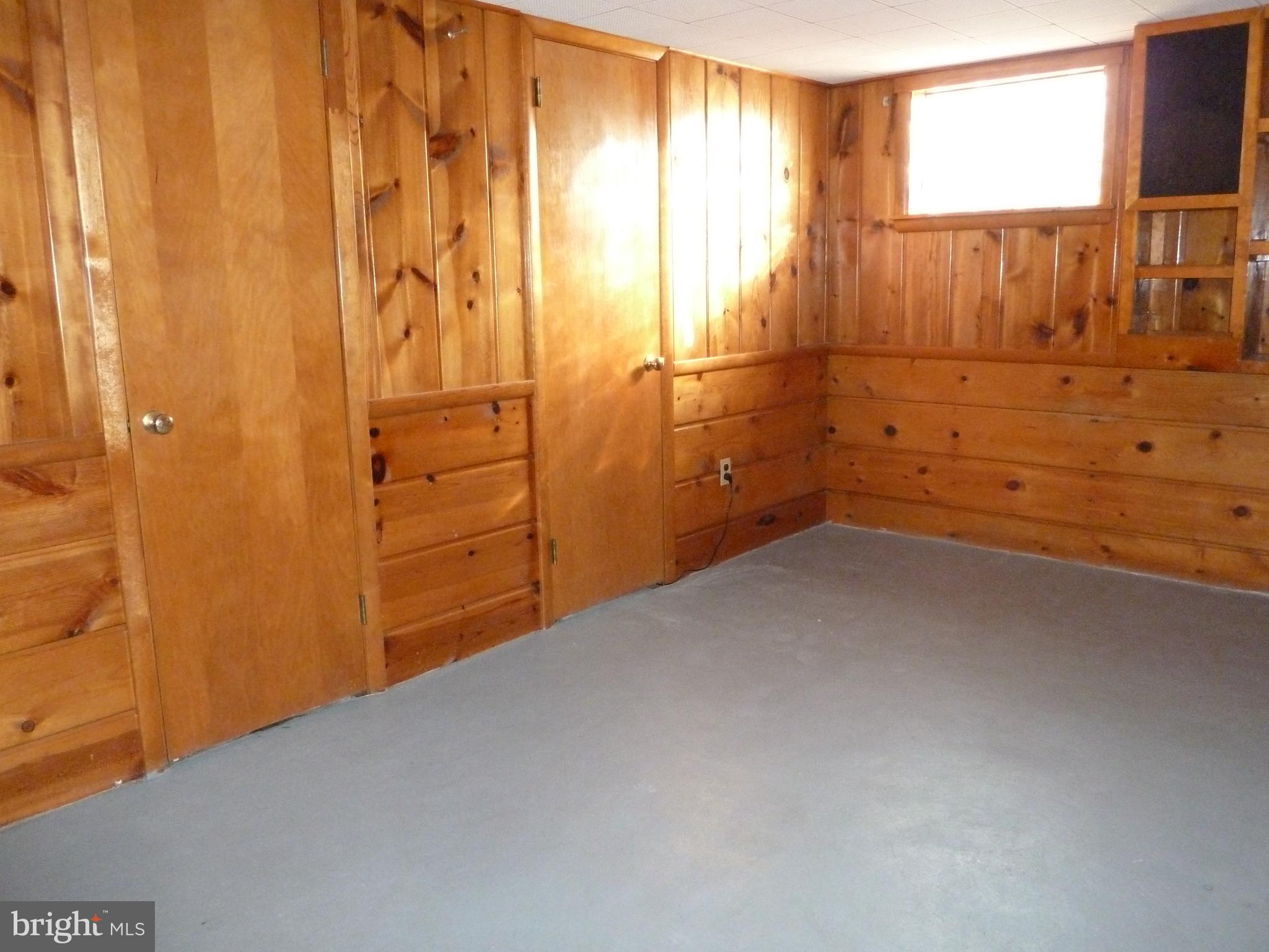 10702 Malone Street Silver Spring, MD 20902 - Photo 25 of 49 Finished Lower Level with Wood Paneling