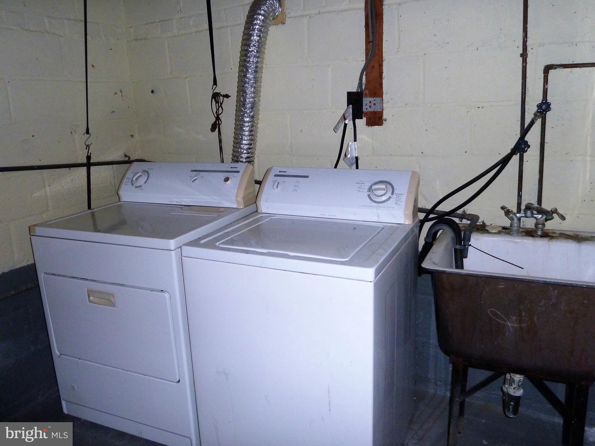 10702 Malone Street Silver Spring, MD 20902 - Photo 39 of 49 Laundry Room with Washer, Dryer & Sink!