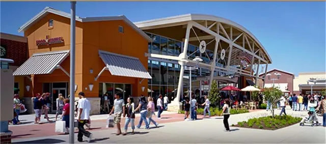 a view of street with shops