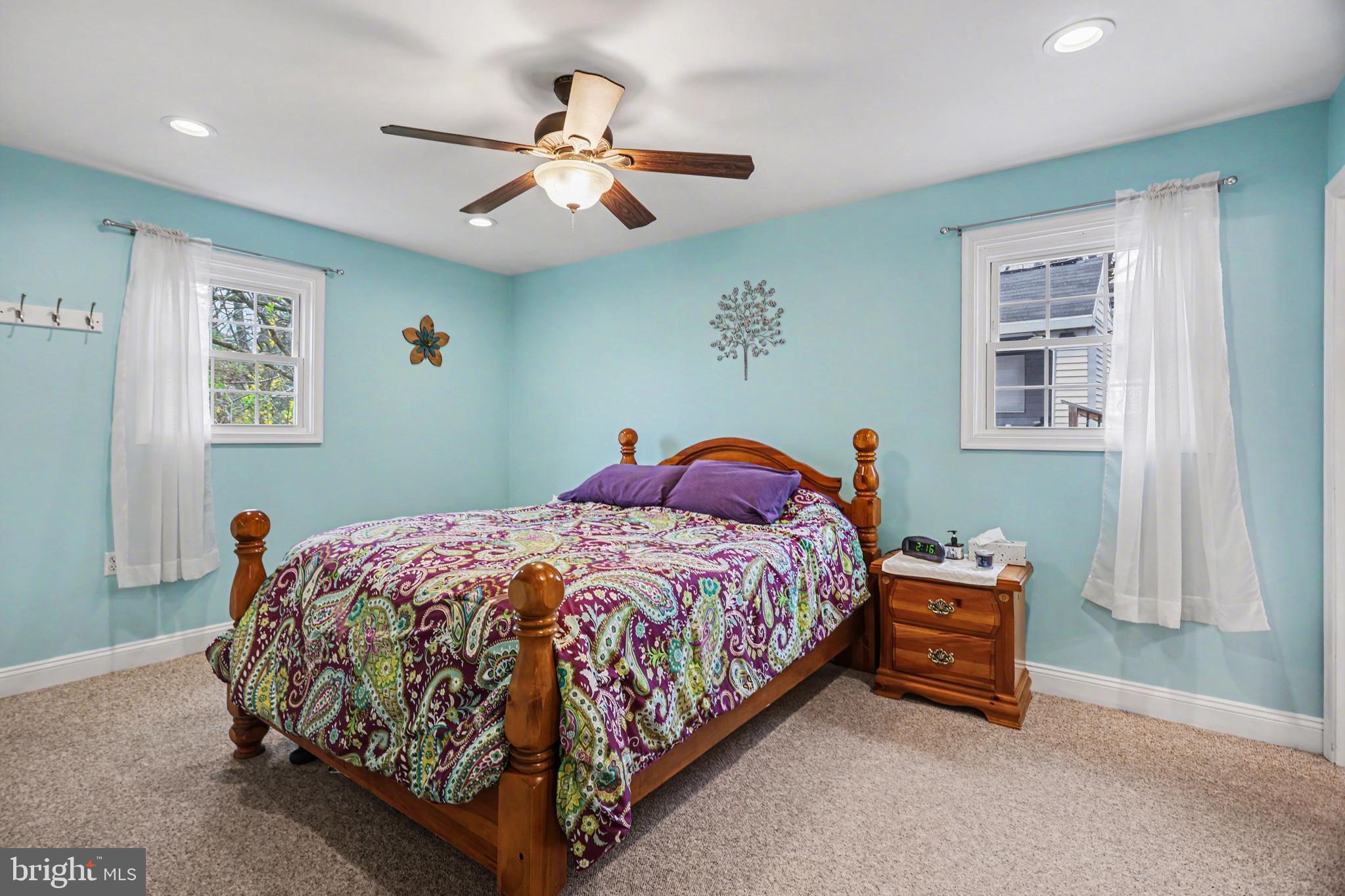 90 Eagle Lane Etters, PA 17319 - Photo 14 of 33 a bedroom with a bed and a chandelier