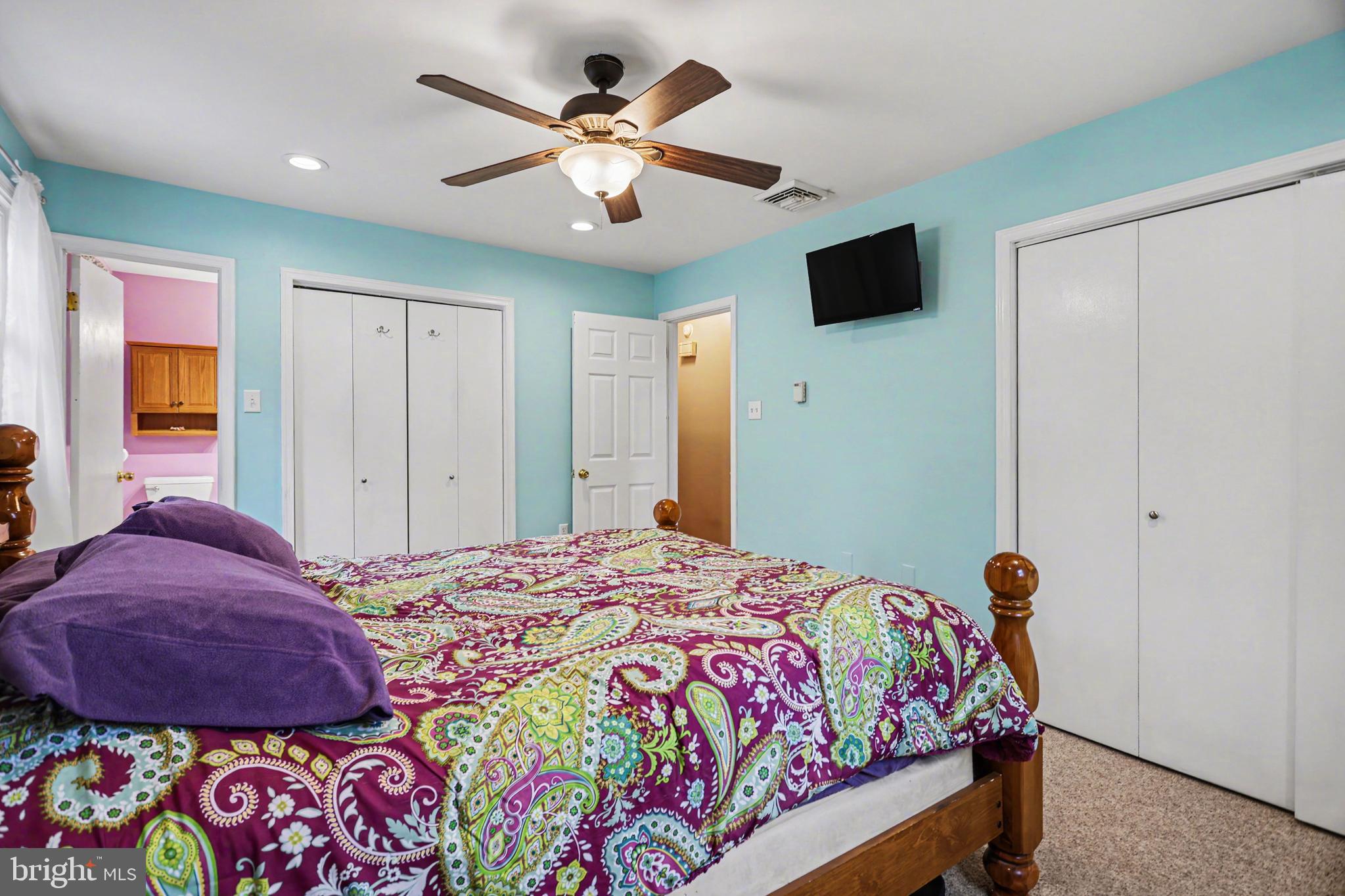 90 Eagle Lane Etters, PA 17319 - Photo 15 of 33 a bedroom with a bed and a chandelier
