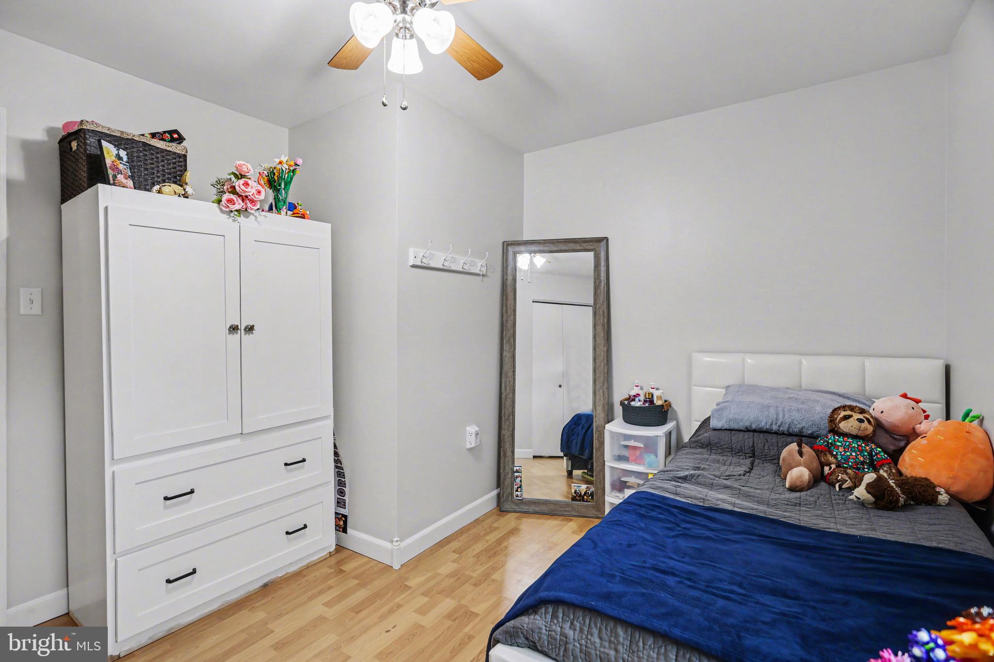 90 Eagle Lane Etters, PA 17319 - Photo 17 of 33 a bed room with a bed and a chandelier