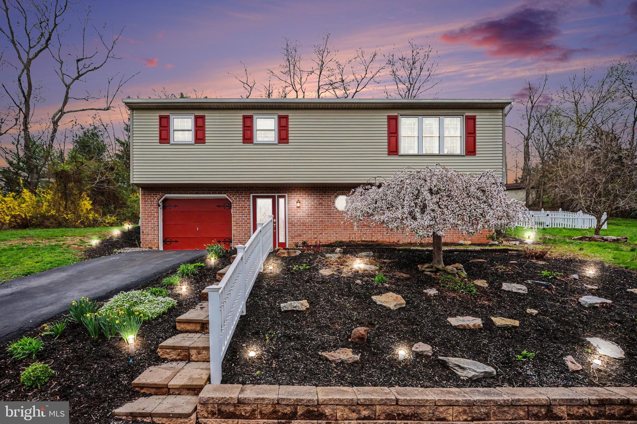 90 Eagle Lane Etters, PA 17319 - Photo 2 of 33 a front view of a house with garden