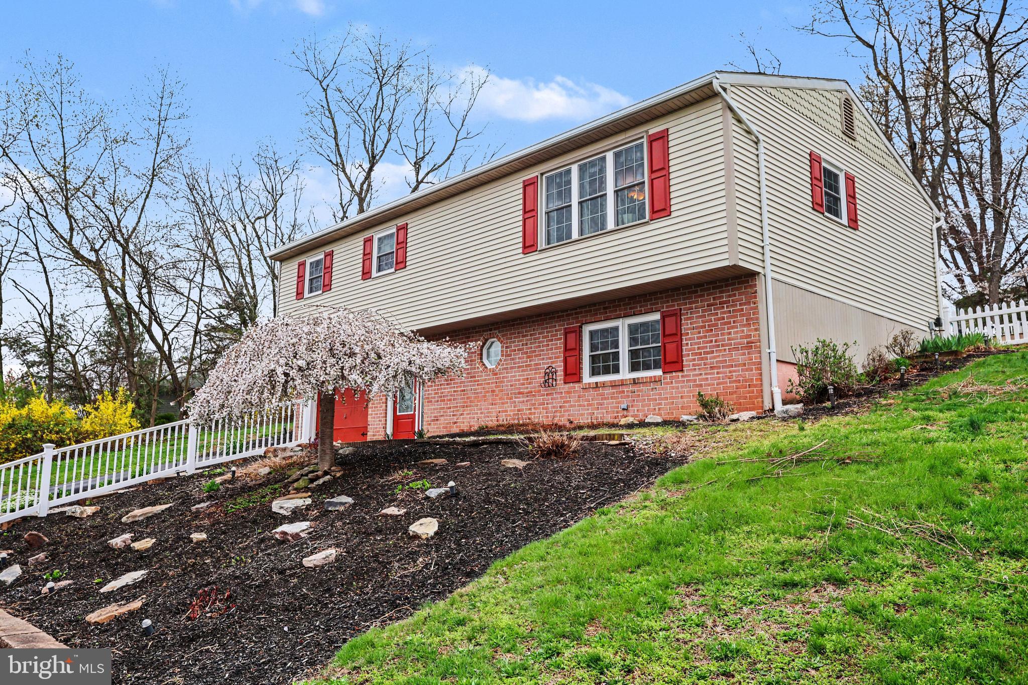 90 Eagle Lane Etters, PA 17319 - Photo 4 of 33 a front view of a house with a yard