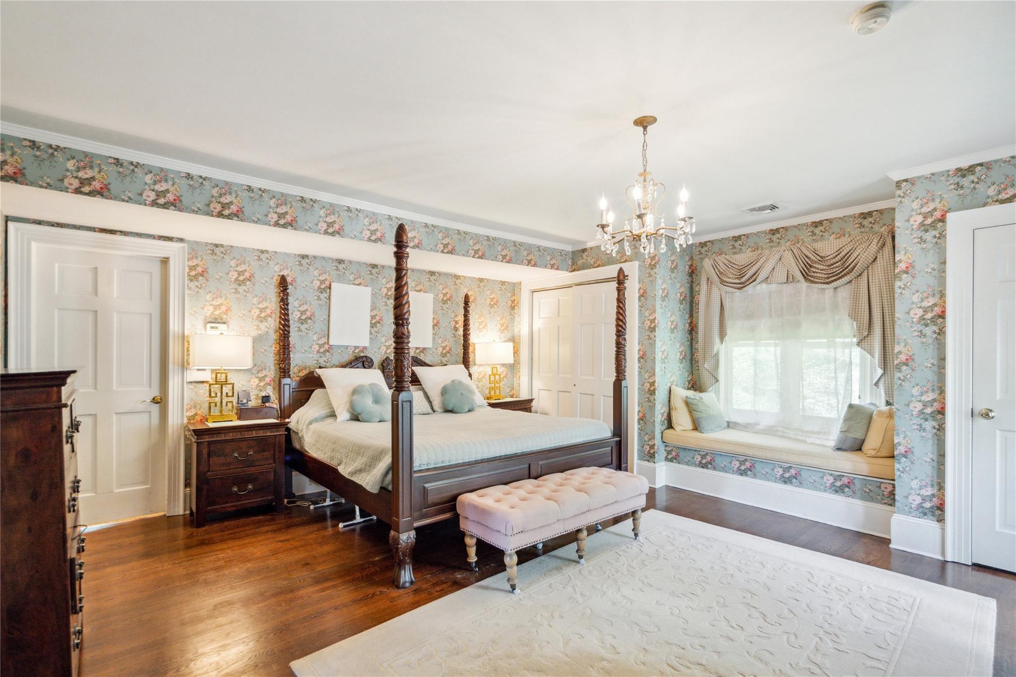 17 The Intervale Roslyn Estates, NY 11577 - Photo 16 of 33 a living room with furniture and a chandelier