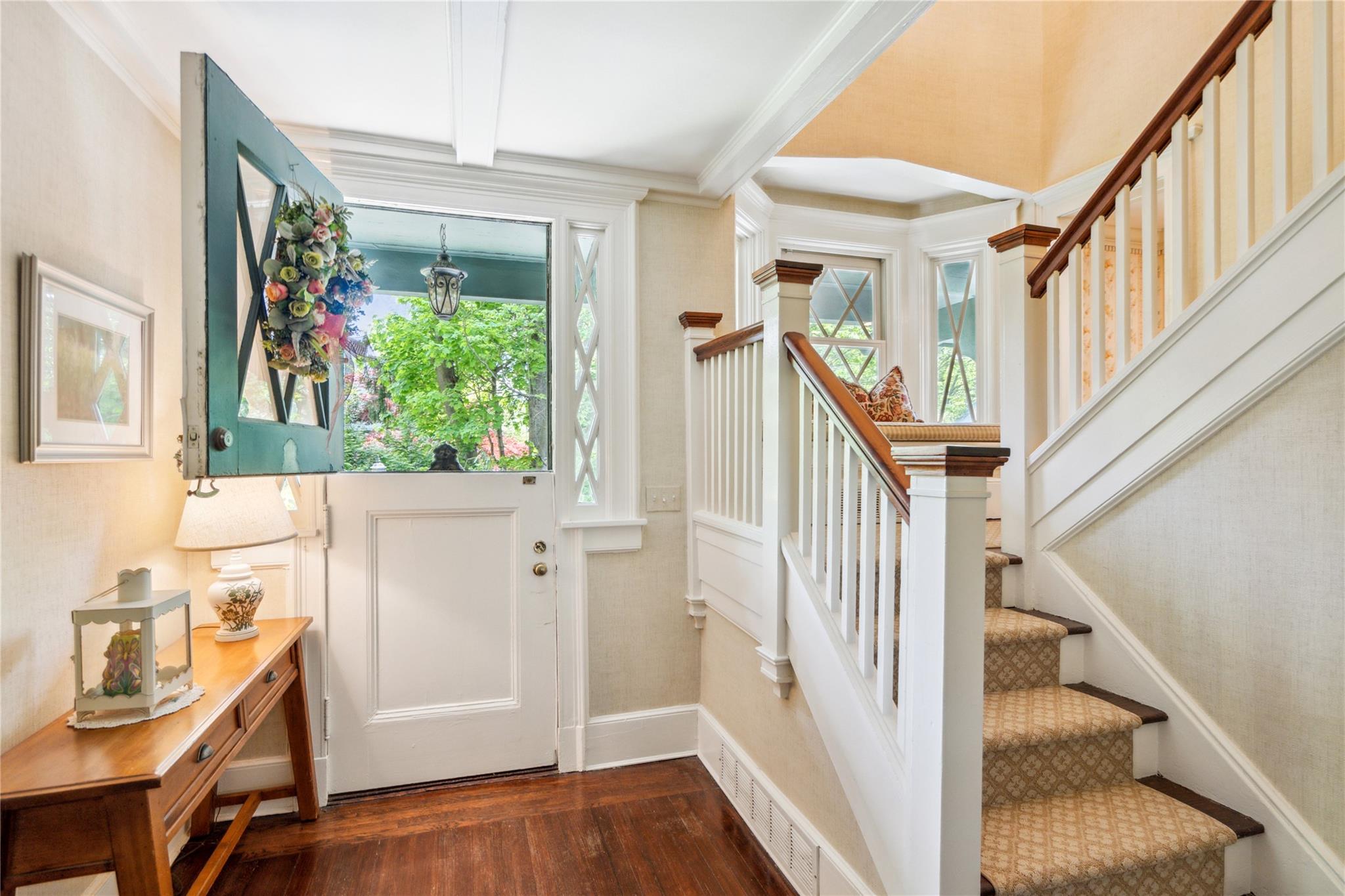17 The Intervale Roslyn Estates, NY 11577 - Photo 4 of 33 a view of an entryway with wooden floor and windows