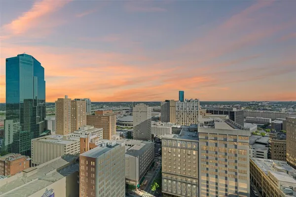 a view of a city with tall buildings