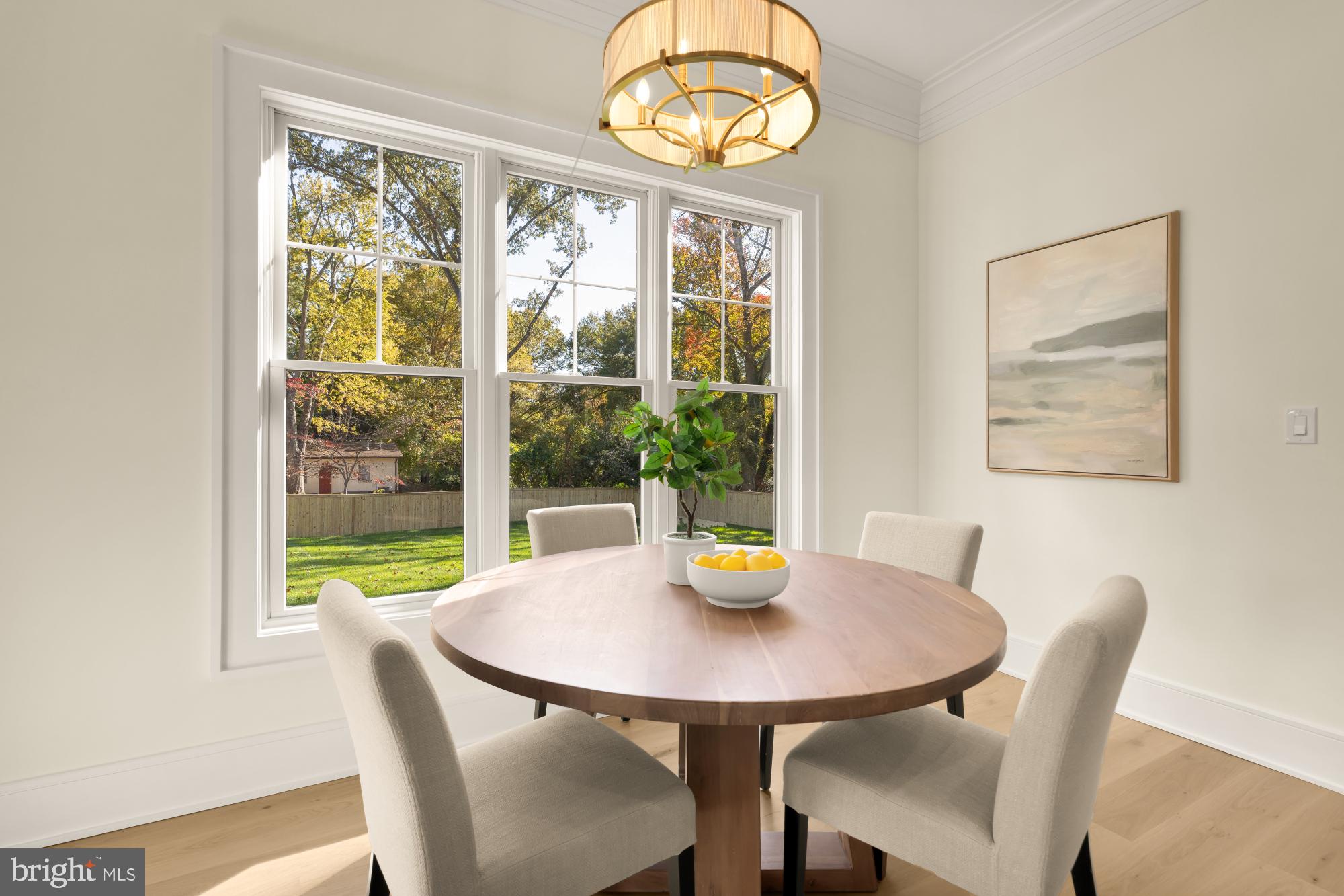 9105 Seven Locks Road Bethesda, MD 20817 - Photo 17 of 84 a view of a dining room with a table and chairs
