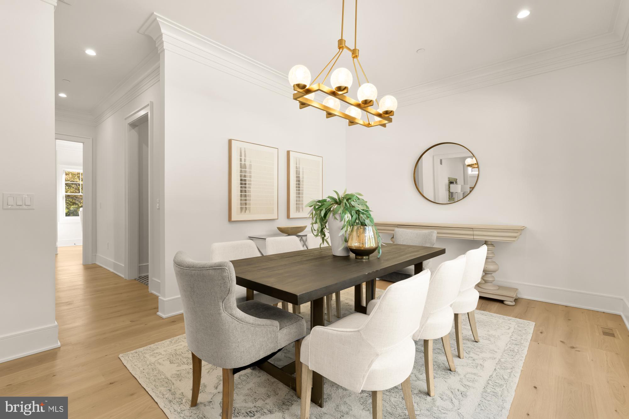 9105 Seven Locks Road Bethesda, MD 20817 - Photo 27 of 84 a view of a dining room furniture and chandelier