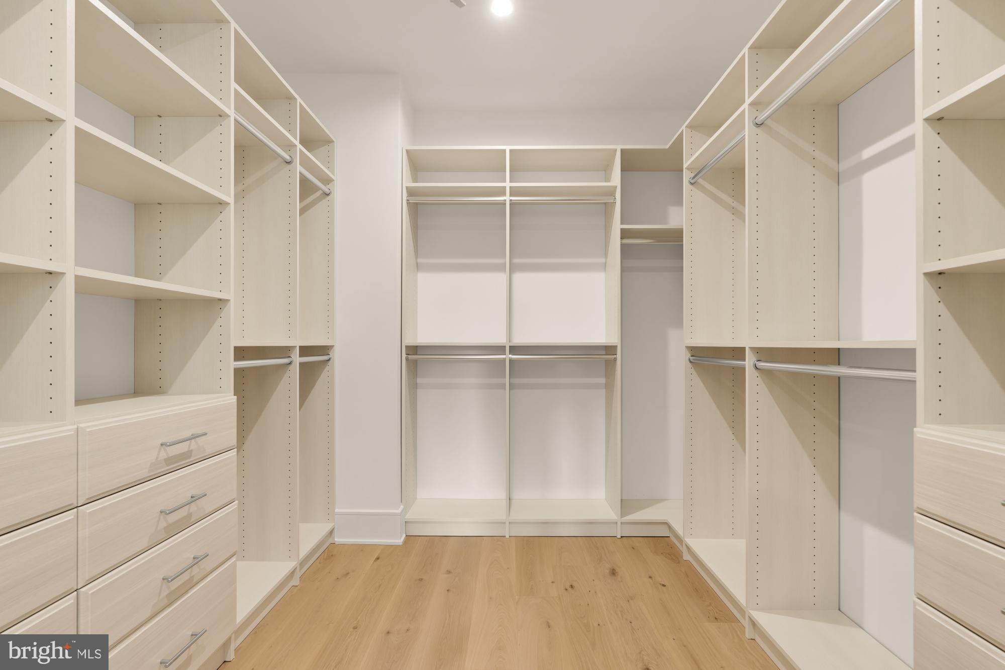 9105 Seven Locks Road Bethesda, MD 20817 - Photo 43 of 84 a view of walk in closet with empty racks
