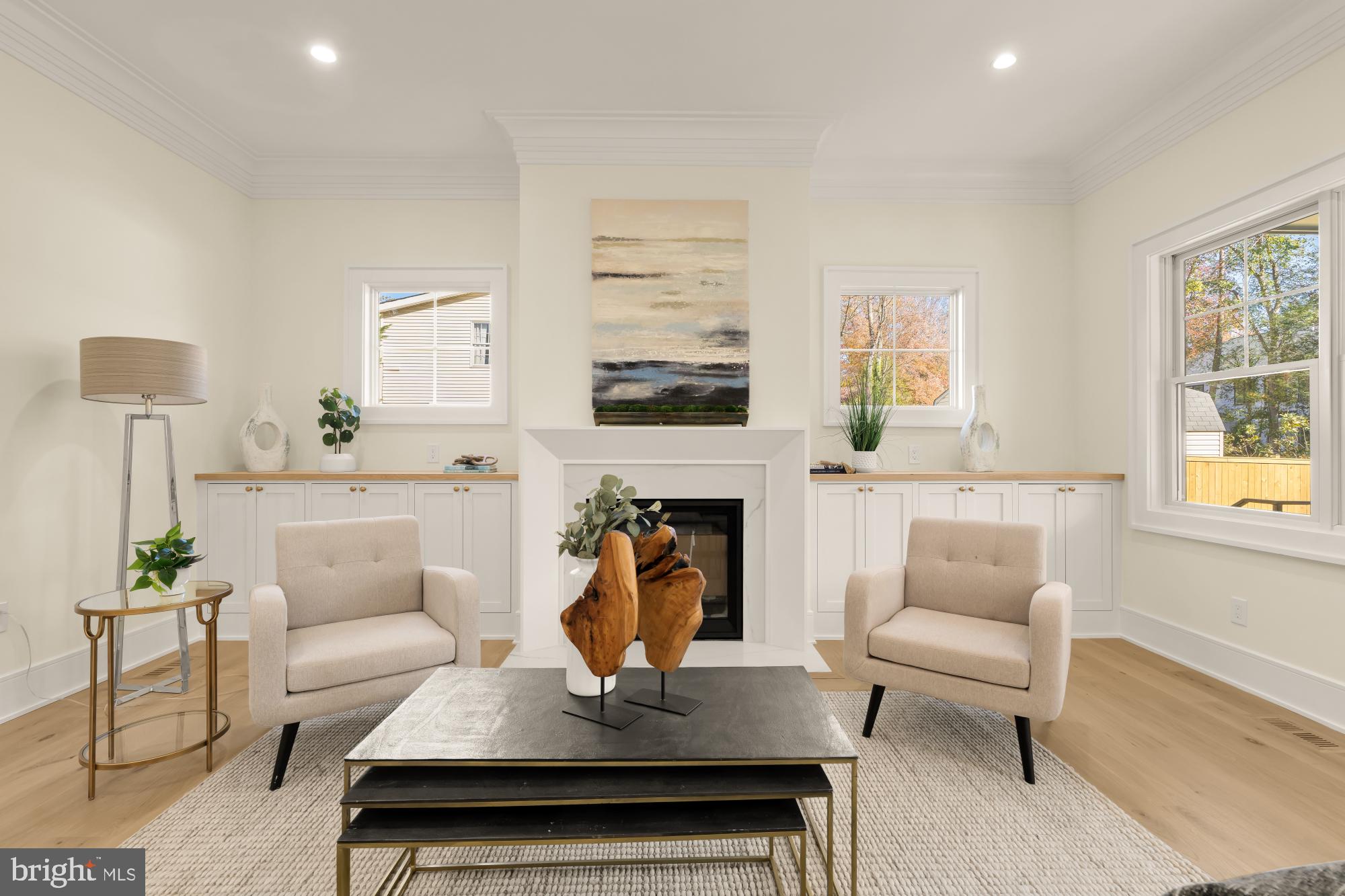 9105 Seven Locks Road Bethesda, MD 20817 - Photo 5 of 84 a living room with furniture and a fireplace