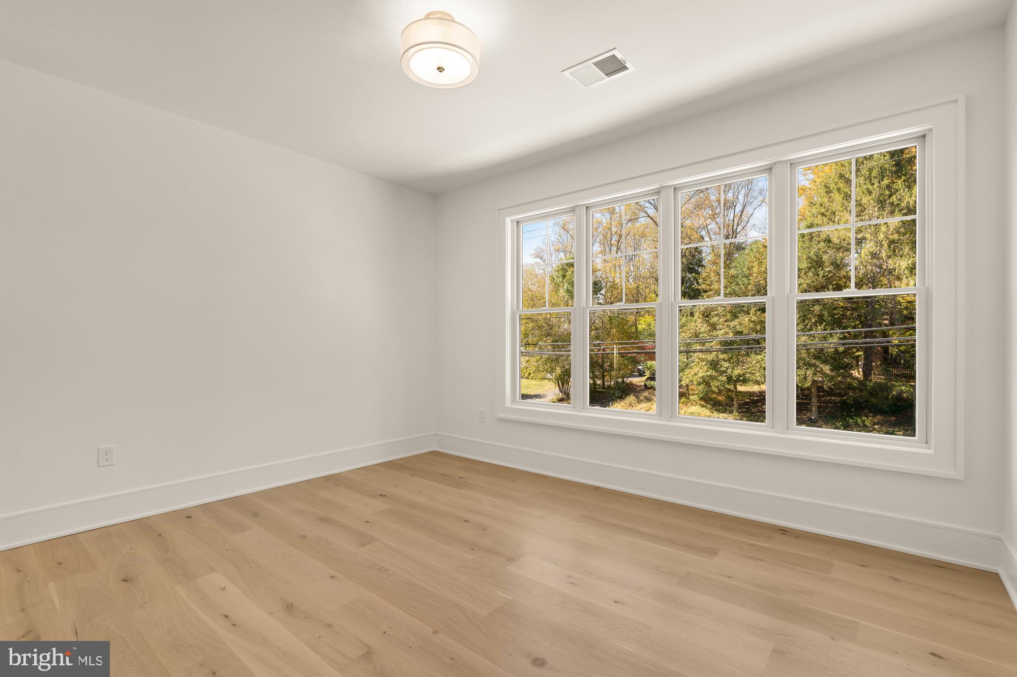 9105 Seven Locks Road Bethesda, MD 20817 - Photo 52 of 84 an empty room with a window
