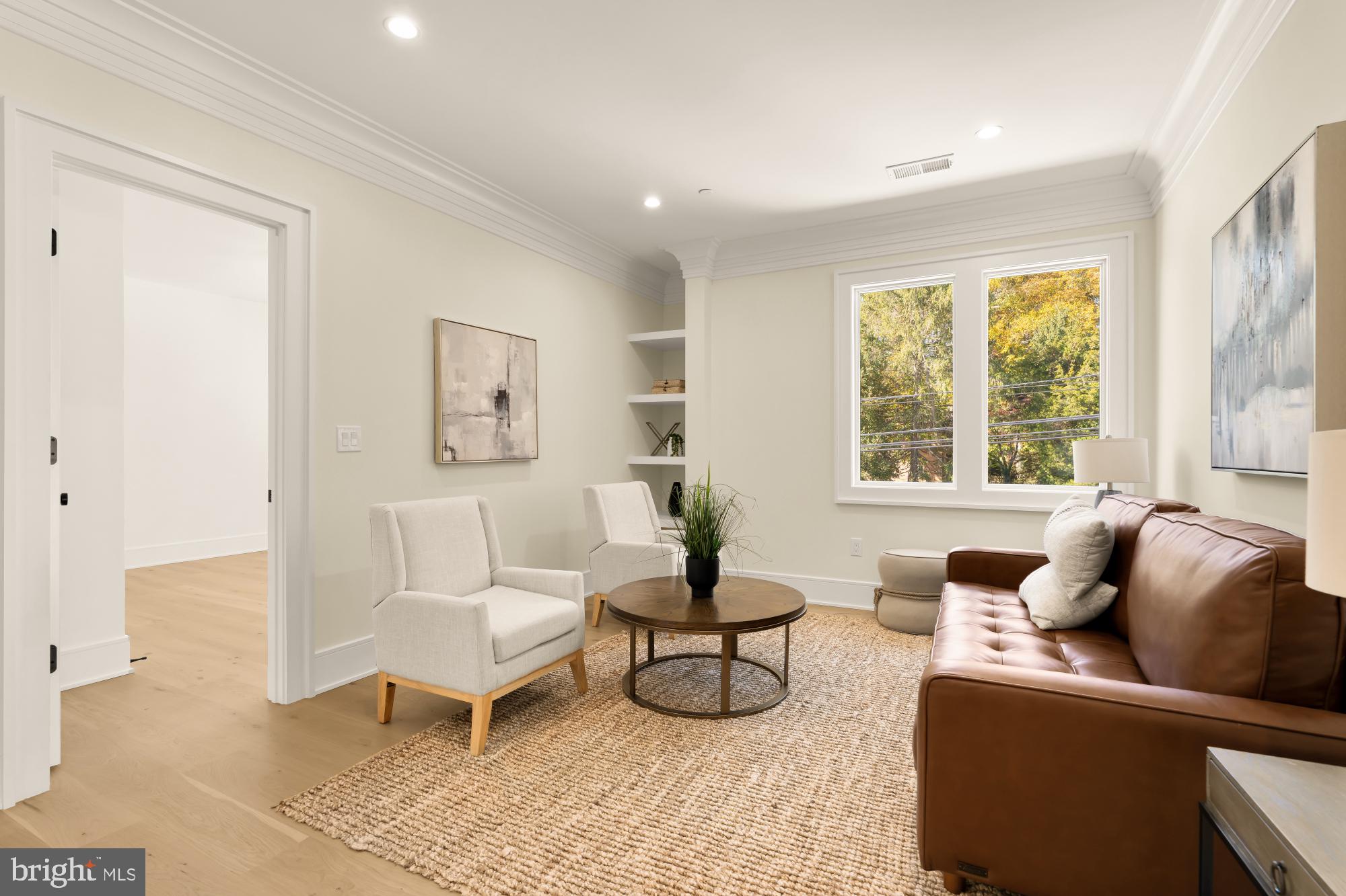 9105 Seven Locks Road Bethesda, MD 20817 - Photo 56 of 84 a living room with furniture and a large window