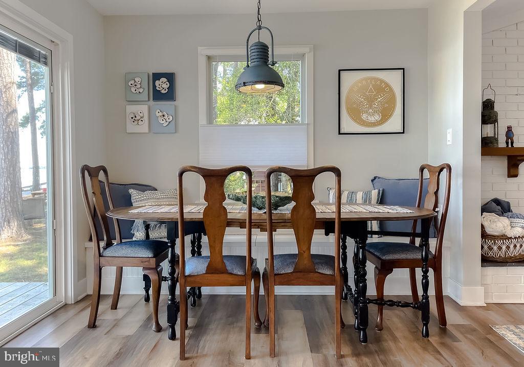 18375 River Road Tall Timbers, MD 20690 - Photo 19 of 61 a view of a dining room with furniture and window