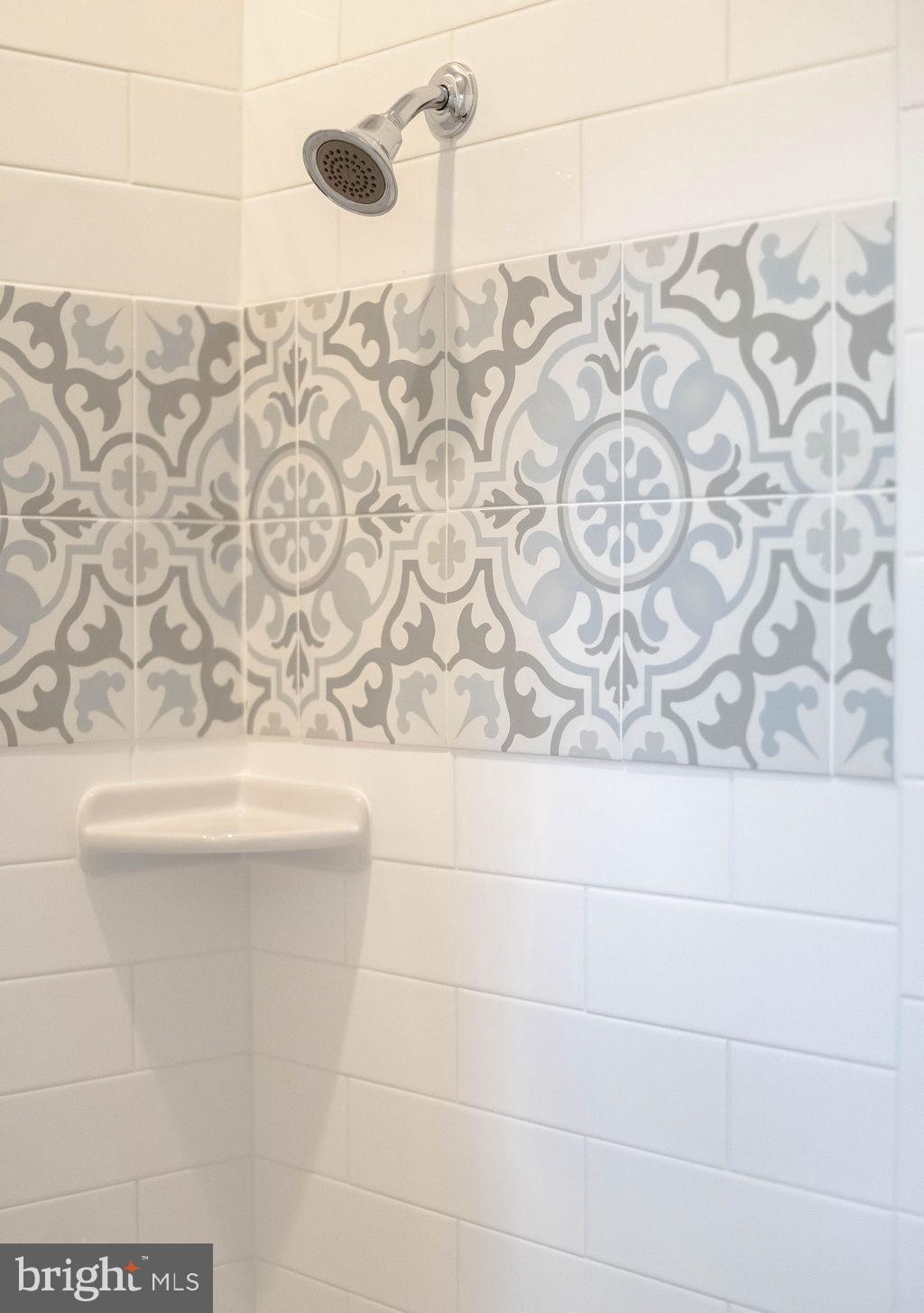 18375 River Road Tall Timbers, MD 20690 - Photo 39 of 61 a bathroom with a bathtub and shower