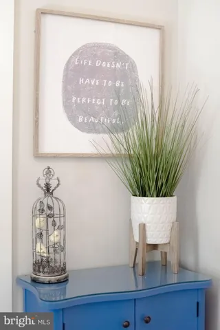 a vase of flowers sitting on a table