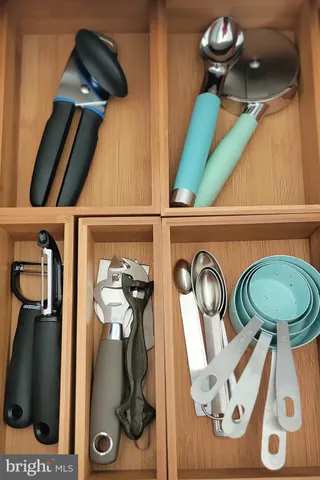 a view of a bench in the garden near a lake