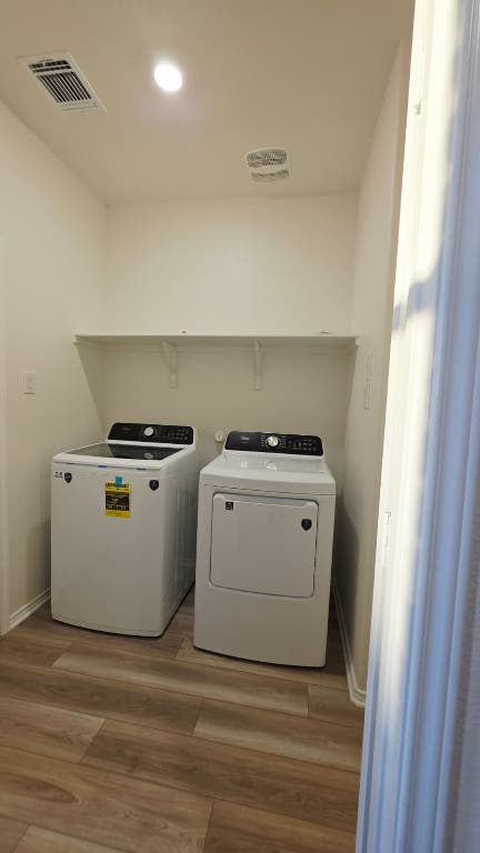 1609 Red Berry Pass Georgetown, TX 78628 - Photo 20 of 29 a utility room with washer and dryer