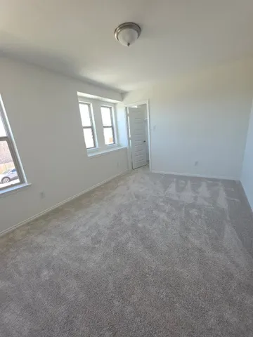 an empty room with window