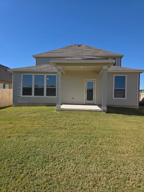 1609 Red Berry Pass Georgetown, TX 78628 - Photo 27 of 29 a view of a house with a backyard