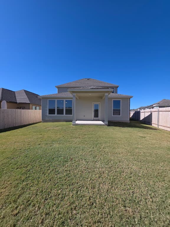 1609 Red Berry Pass Georgetown, TX 78628 - Photo 28 of 29 a house view with a garden space