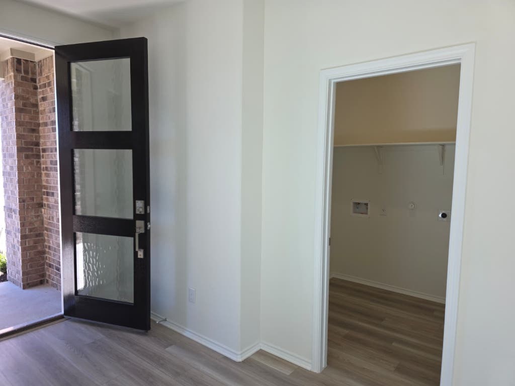 1609 Red Berry Pass Georgetown, TX 78628 - Photo 5 of 29 a view of empty room with wooden floor