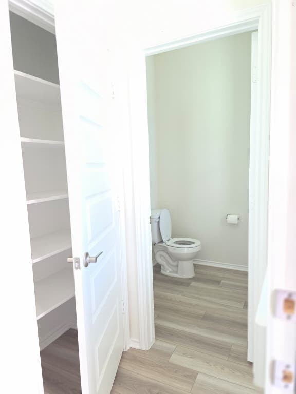 1609 Red Berry Pass Georgetown, TX 78628 - Photo 6 of 29 a bathroom with a toilet and a shower