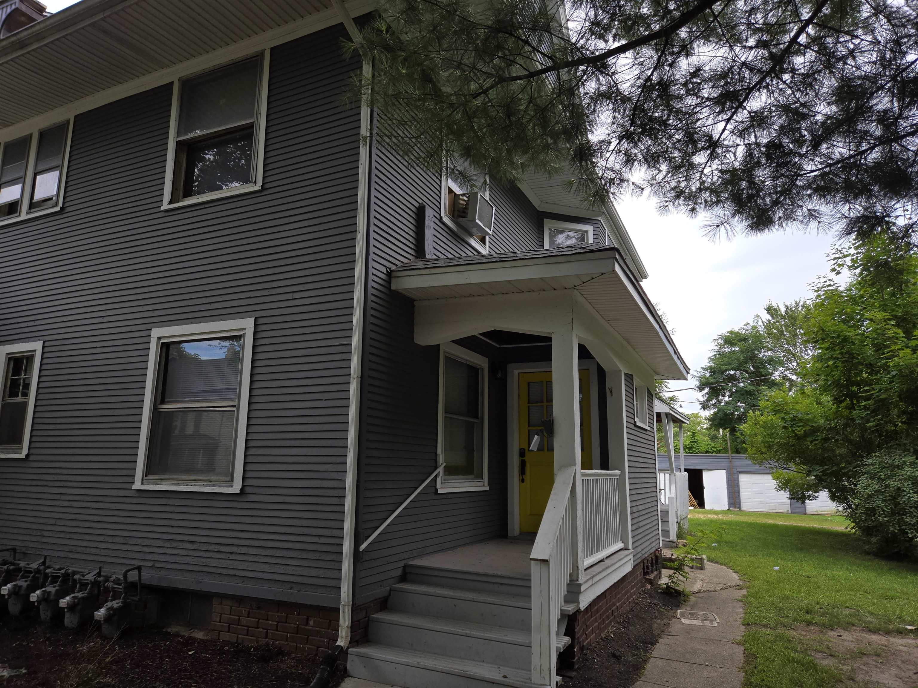 412-414 May Street Rockford, IL 61104 - Photo 2 of 11 a view of a house with a yard