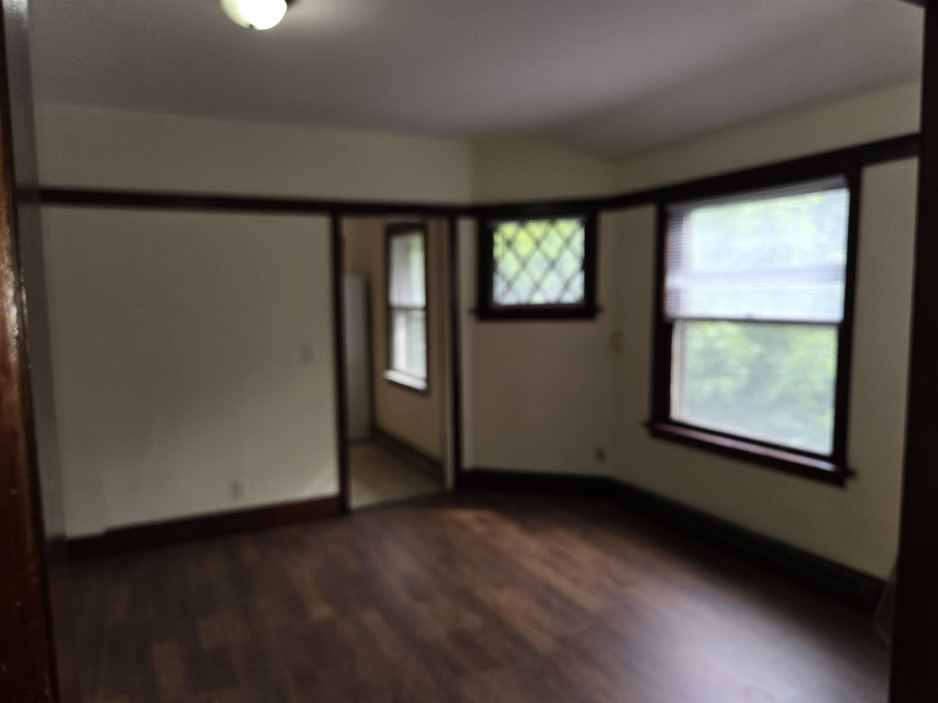 412-414 May Street Rockford, IL 61104 - Photo 7 of 11 an empty room with windows